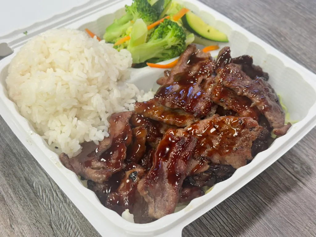Savory teriyaki-glazed beef with rice and veggies at Chop Sushi & Grill, a Japanese Restaurant in Los Angeles