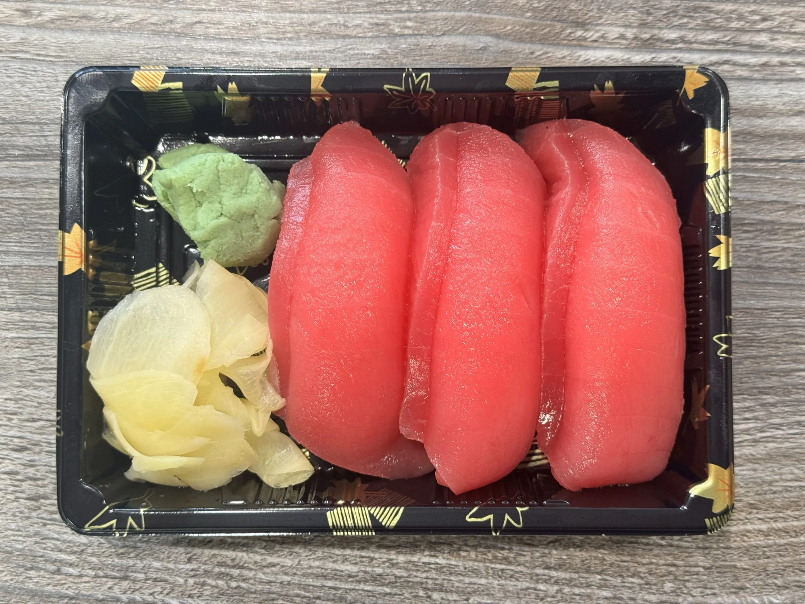Fresh tuna nigiri with wasabi and ginger at Chop Sushi & Grill, a Japanese Restaurant in Los Angeles